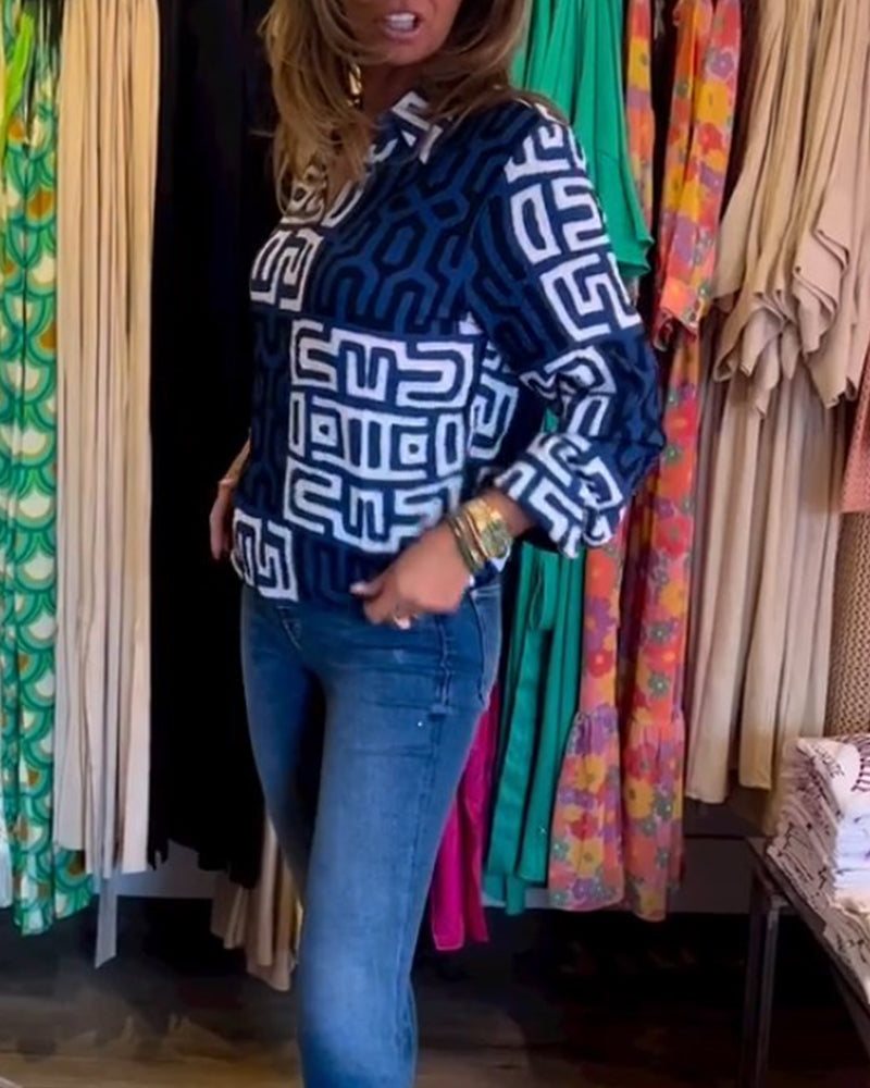 Långärmad topp med V-ringning och tryck