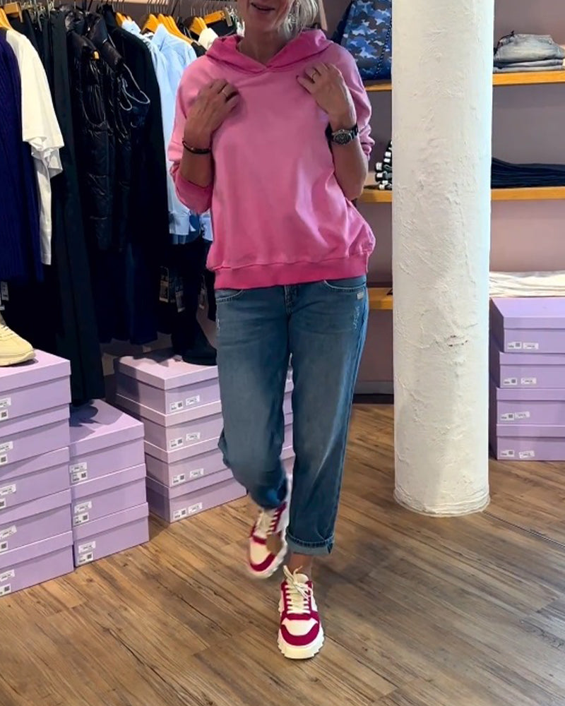 Avslappnad luvtröja med lutning