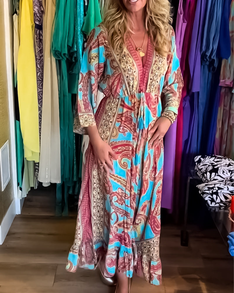 Långärmad lång klänning med modetryck