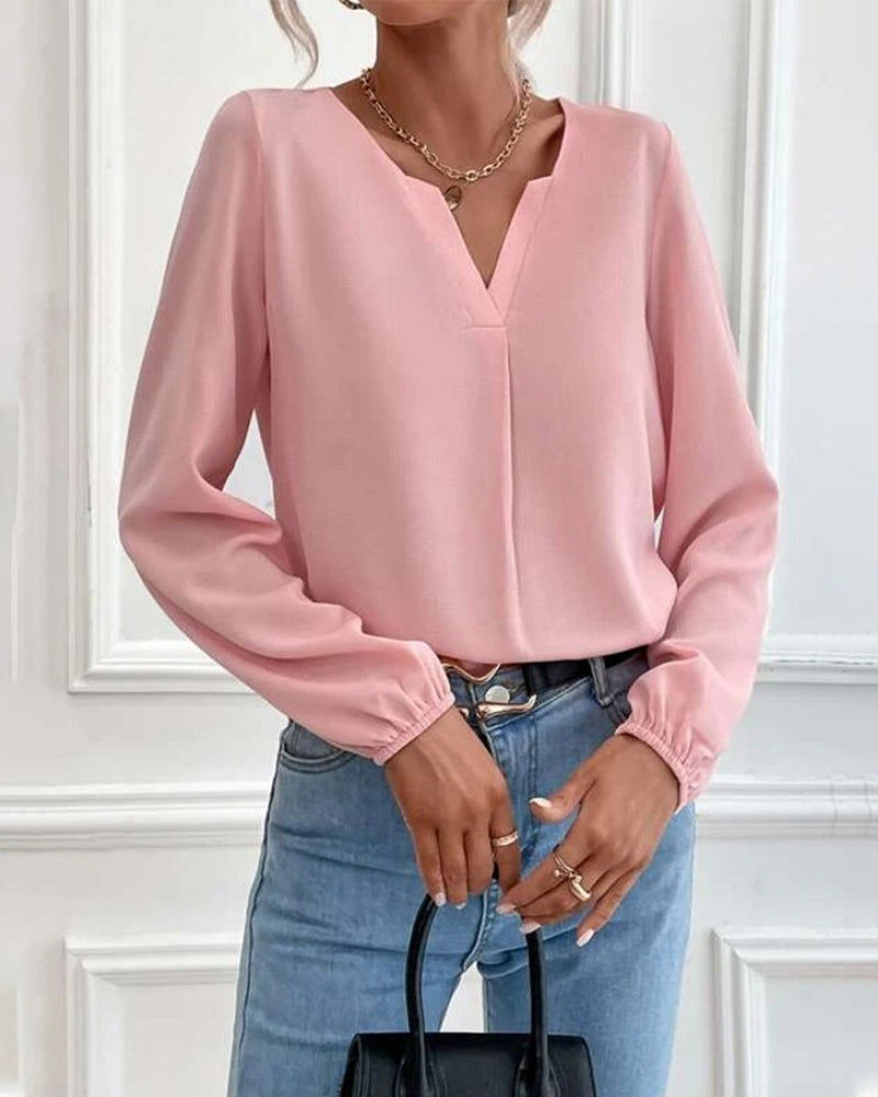 Blus med enfärgad med långärmad