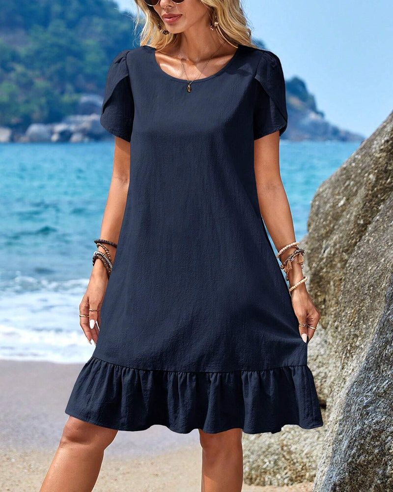 Kortärmad patchworkklänning med rund hals