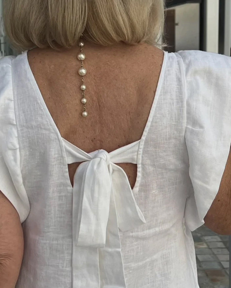 Klänning med konstnärlig touch och ärmlös