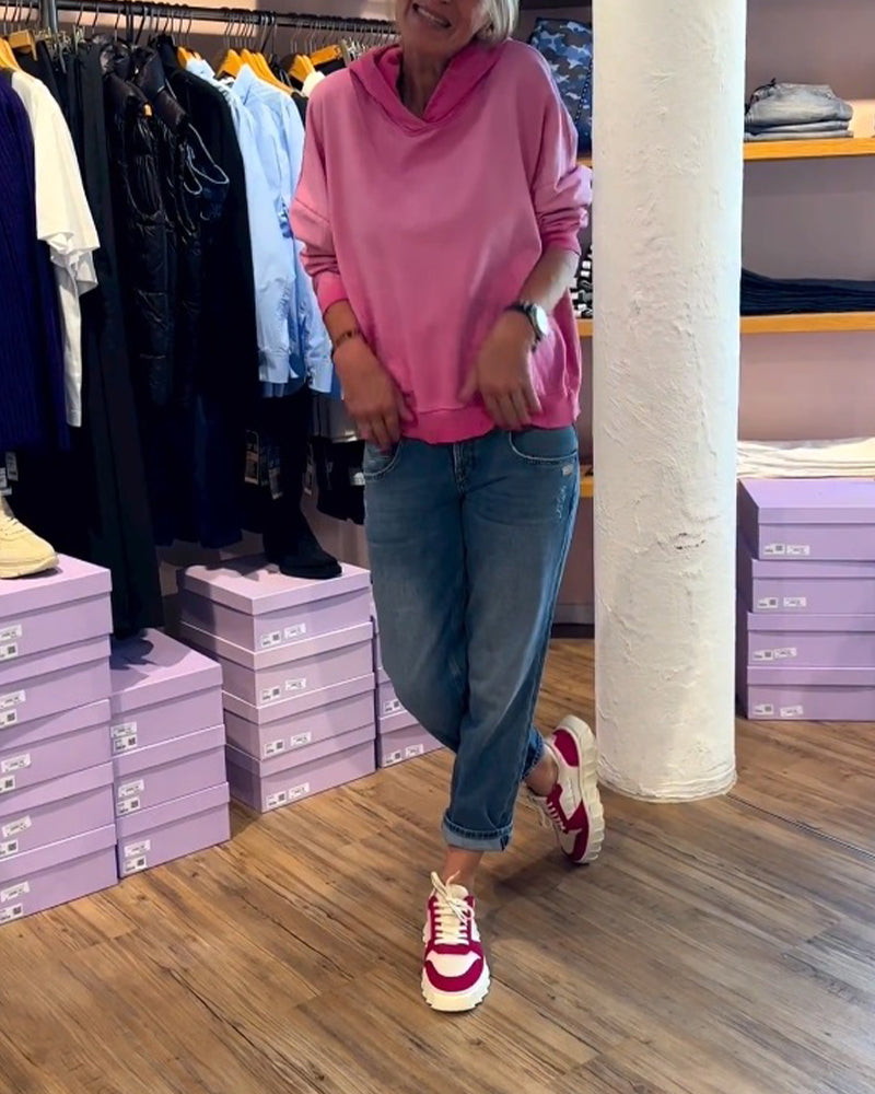 Avslappnad luvtröja med lutning