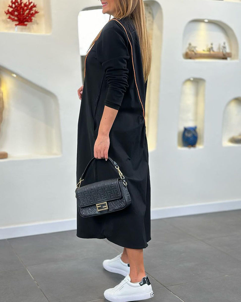 Skiftklänning med ficka och långärmad