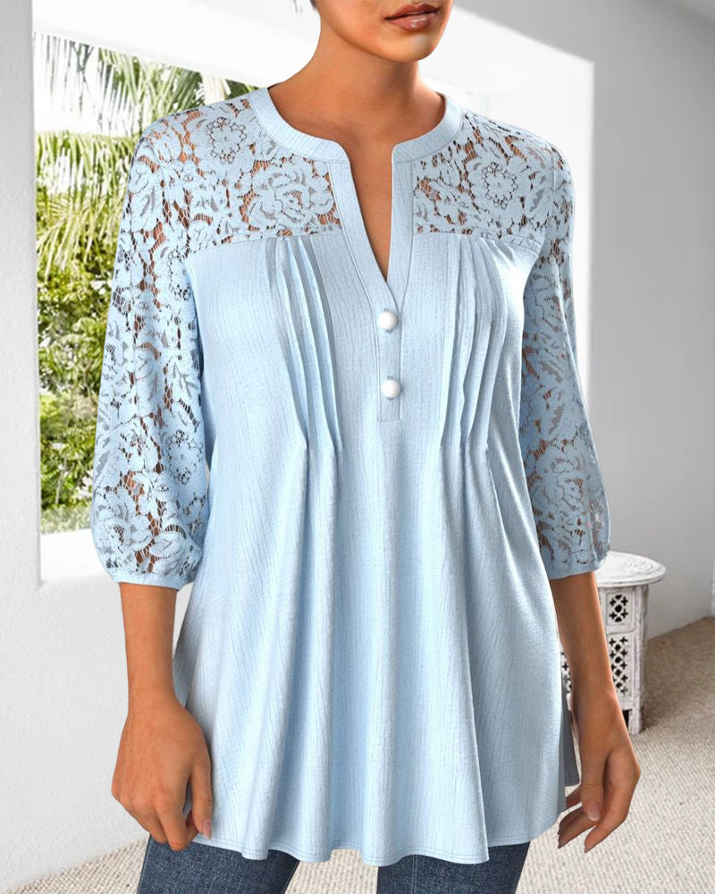 Blus med instickssöm och delad hals