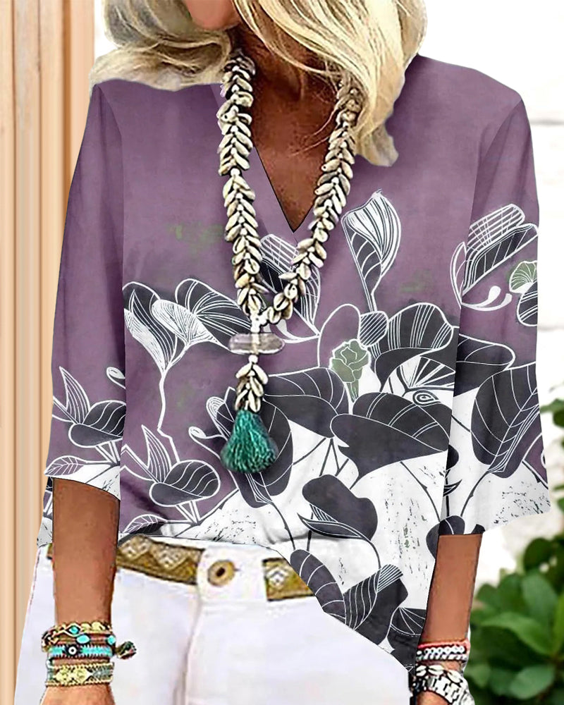 Tryckt V-ringad blus med 3/4 ärmar