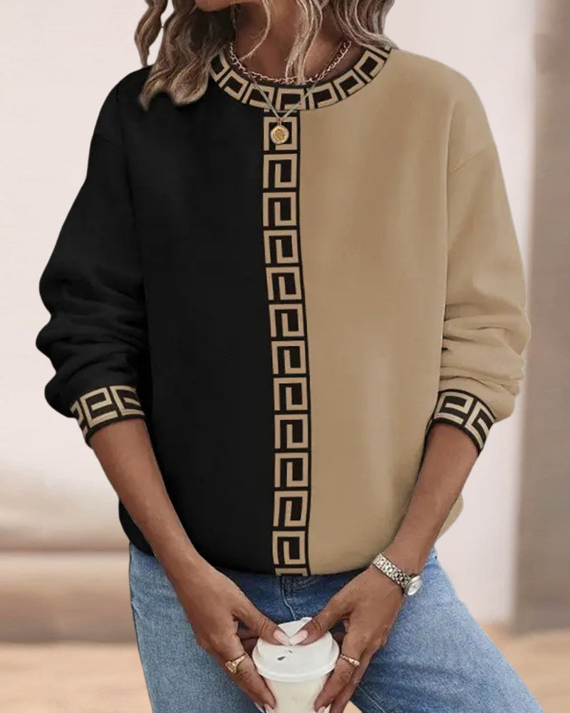 Avslappnad topp med rund hals och färgblock