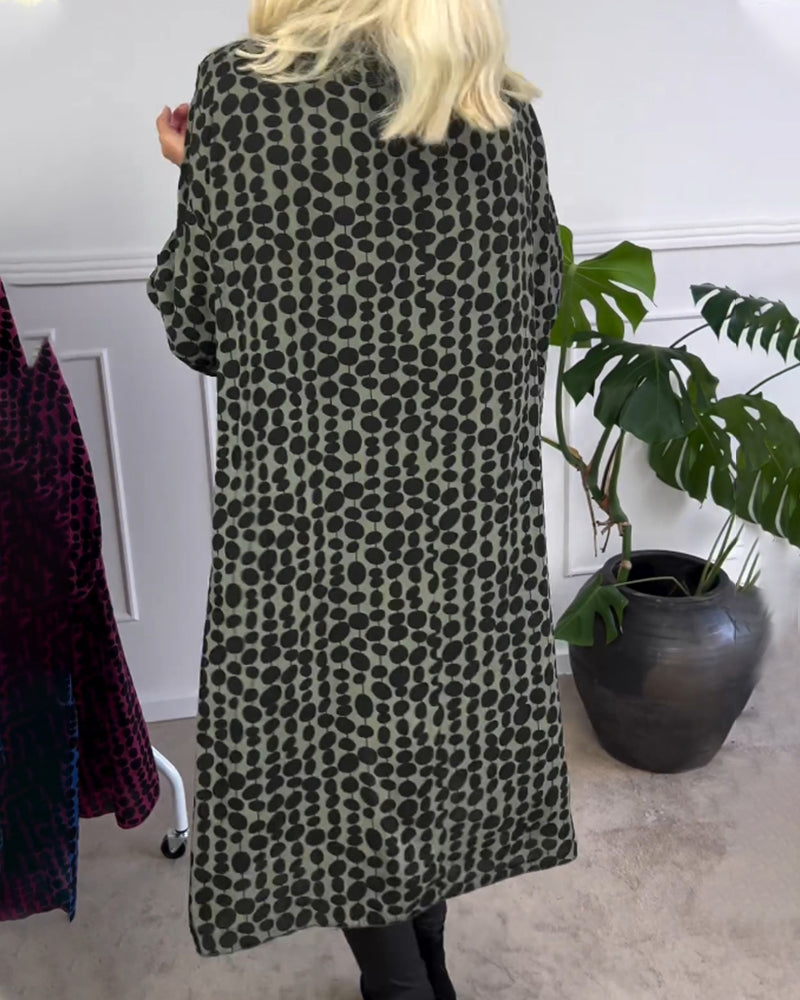 Retro prickig klänning med v-ringad hals