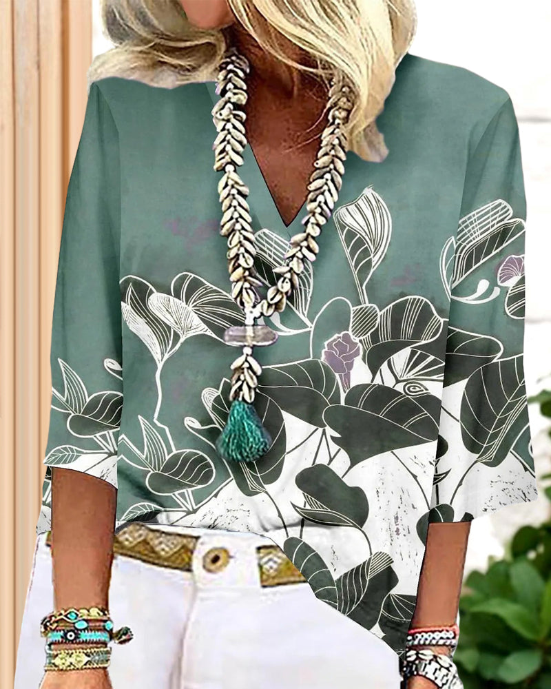 Tryckt V-ringad blus med 3/4 ärmar