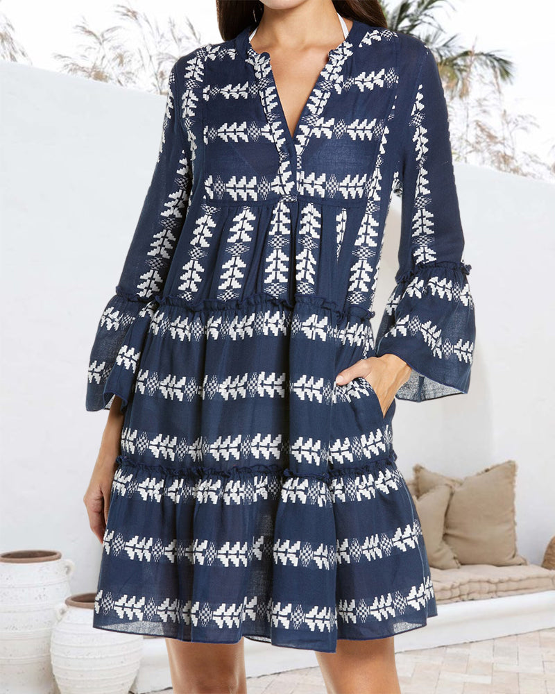 Elegant kort klänning med modetryck