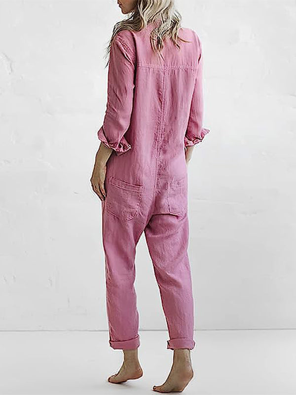Långärmad jumpsuit med knäppning och avslappnad reversficka