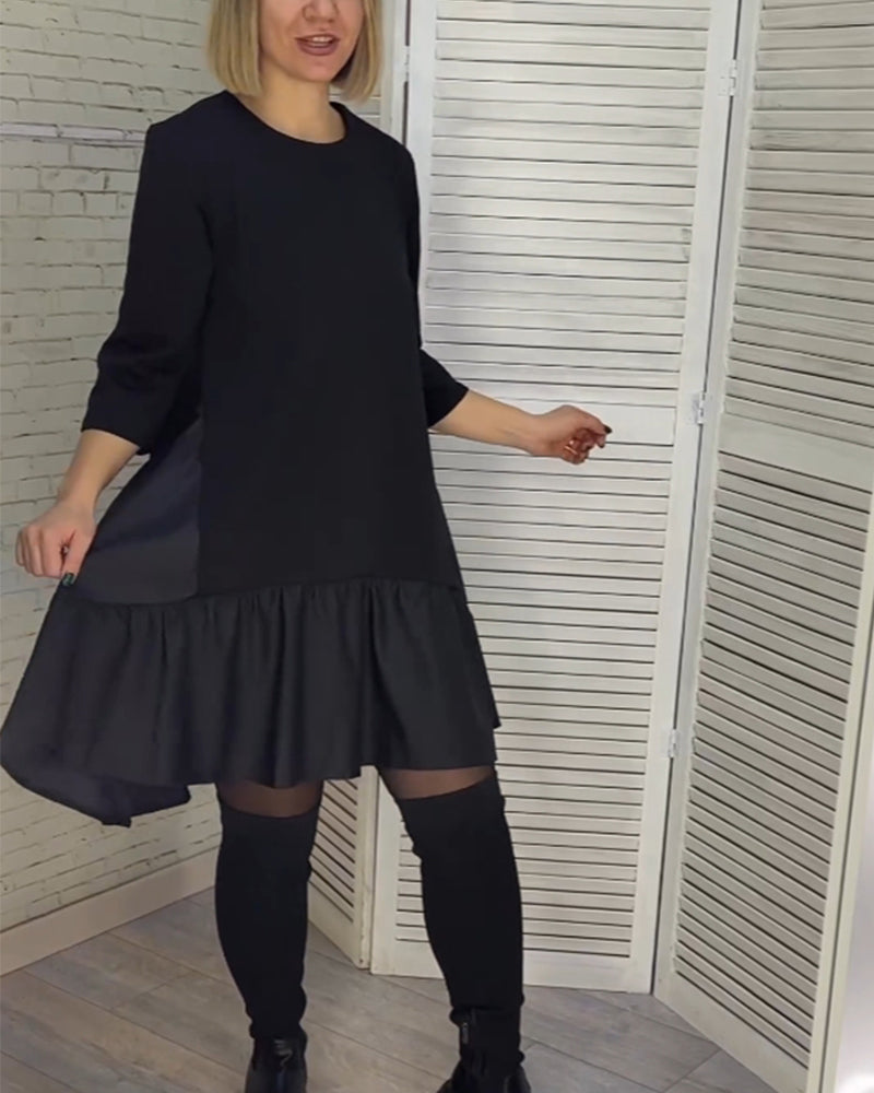 Klänning med rund hals och elegans