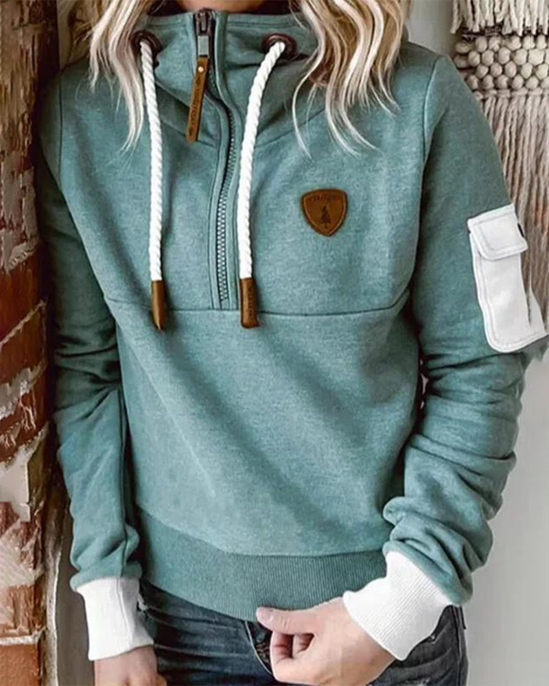 Avslappnad hoodie med halv dragkedja