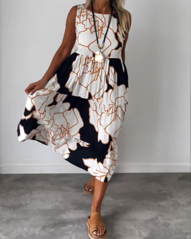 Klänning med ärmar och blommönster