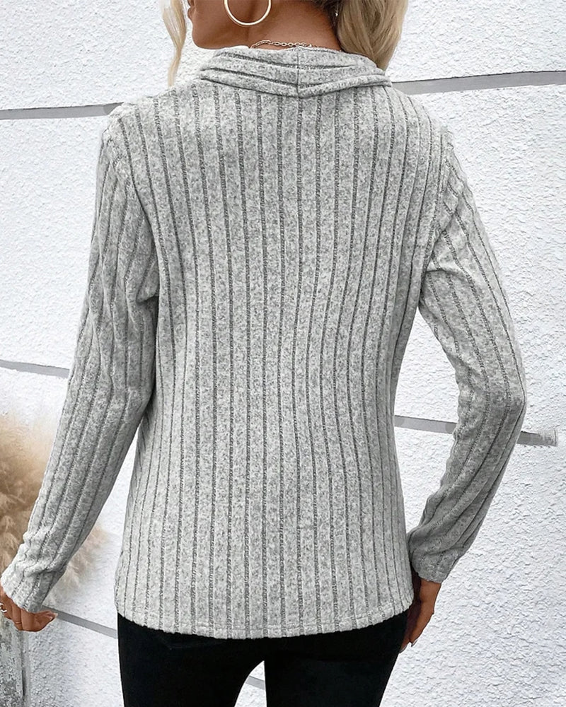 V-ringad crossover stickad topp