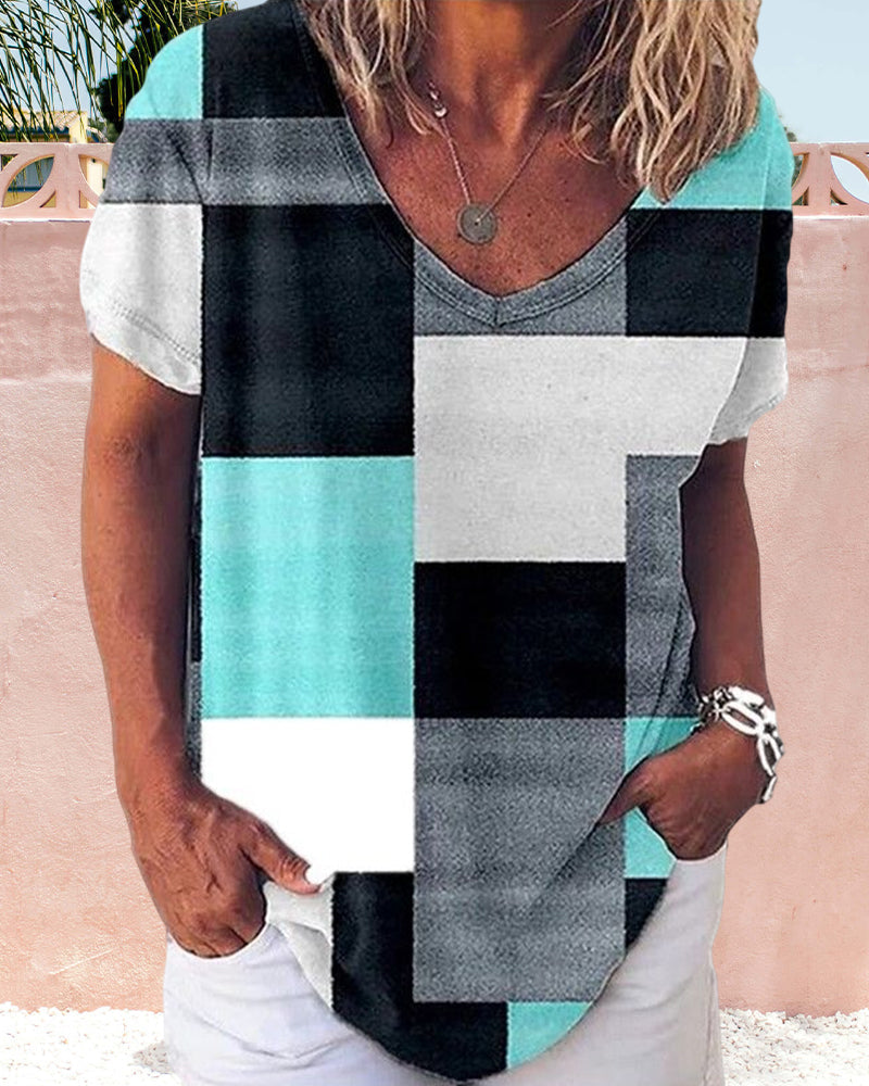 Blommig och plädtryckt T-shirt med korta ärmar