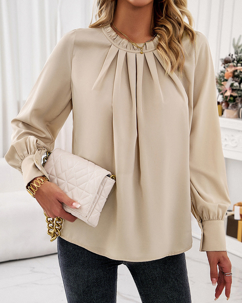 Elegant blus med volanger