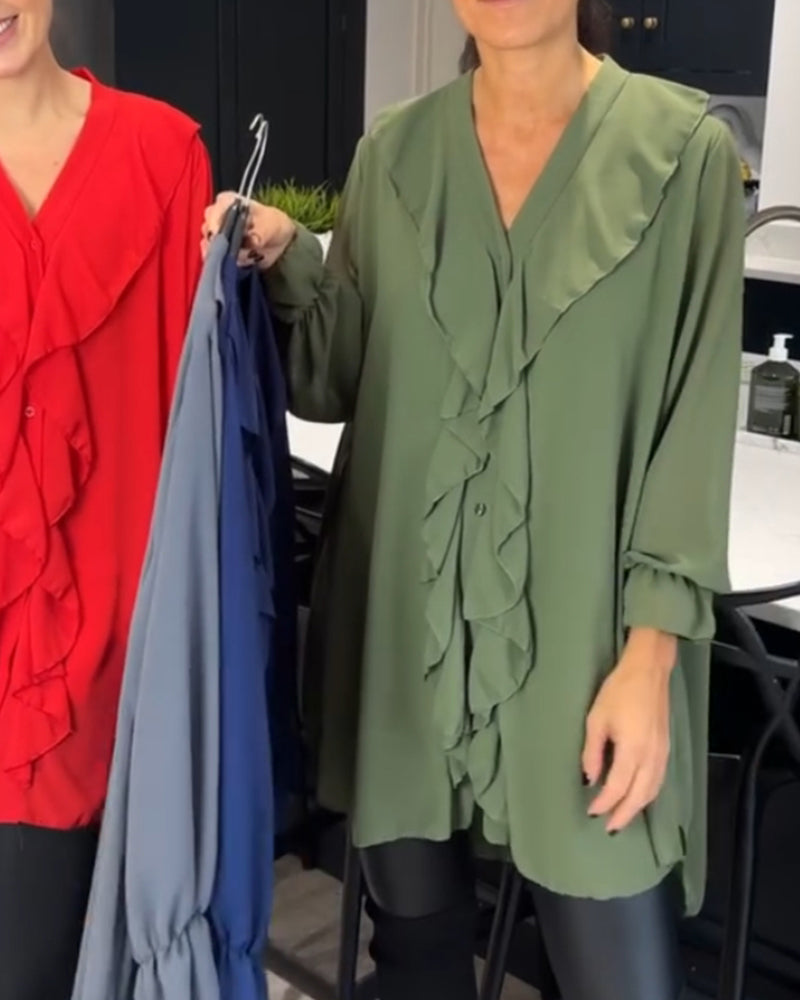 Enfärgad blus med v-ringad lotusblad