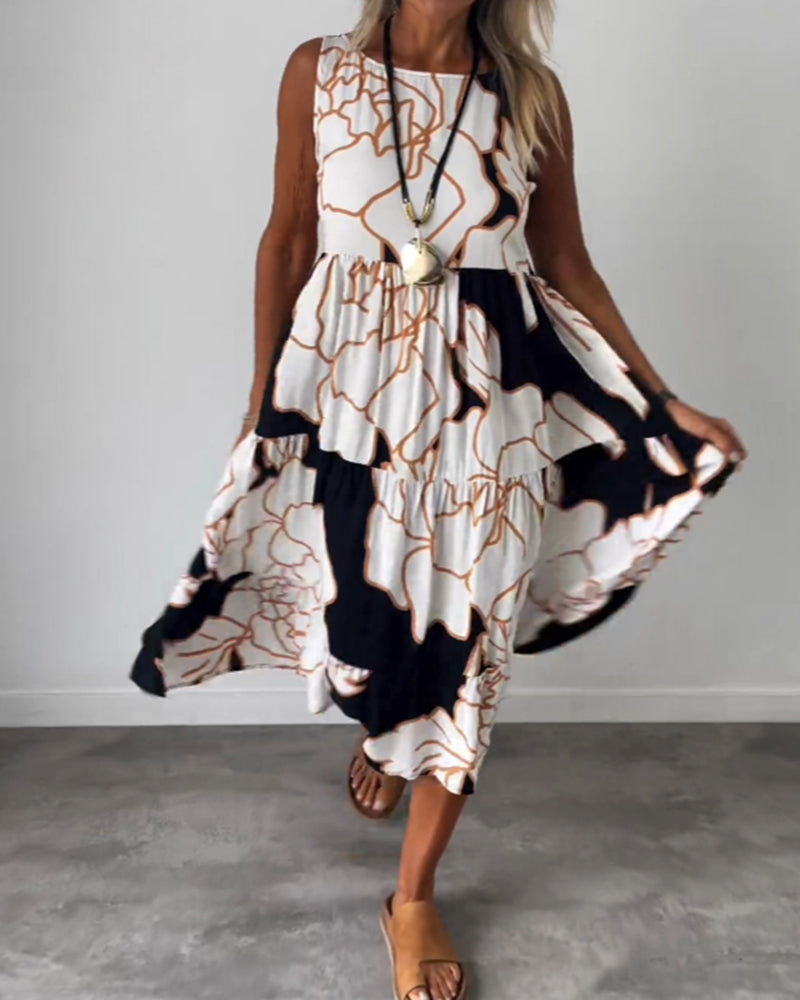 Klänning med ärmar och blommönster