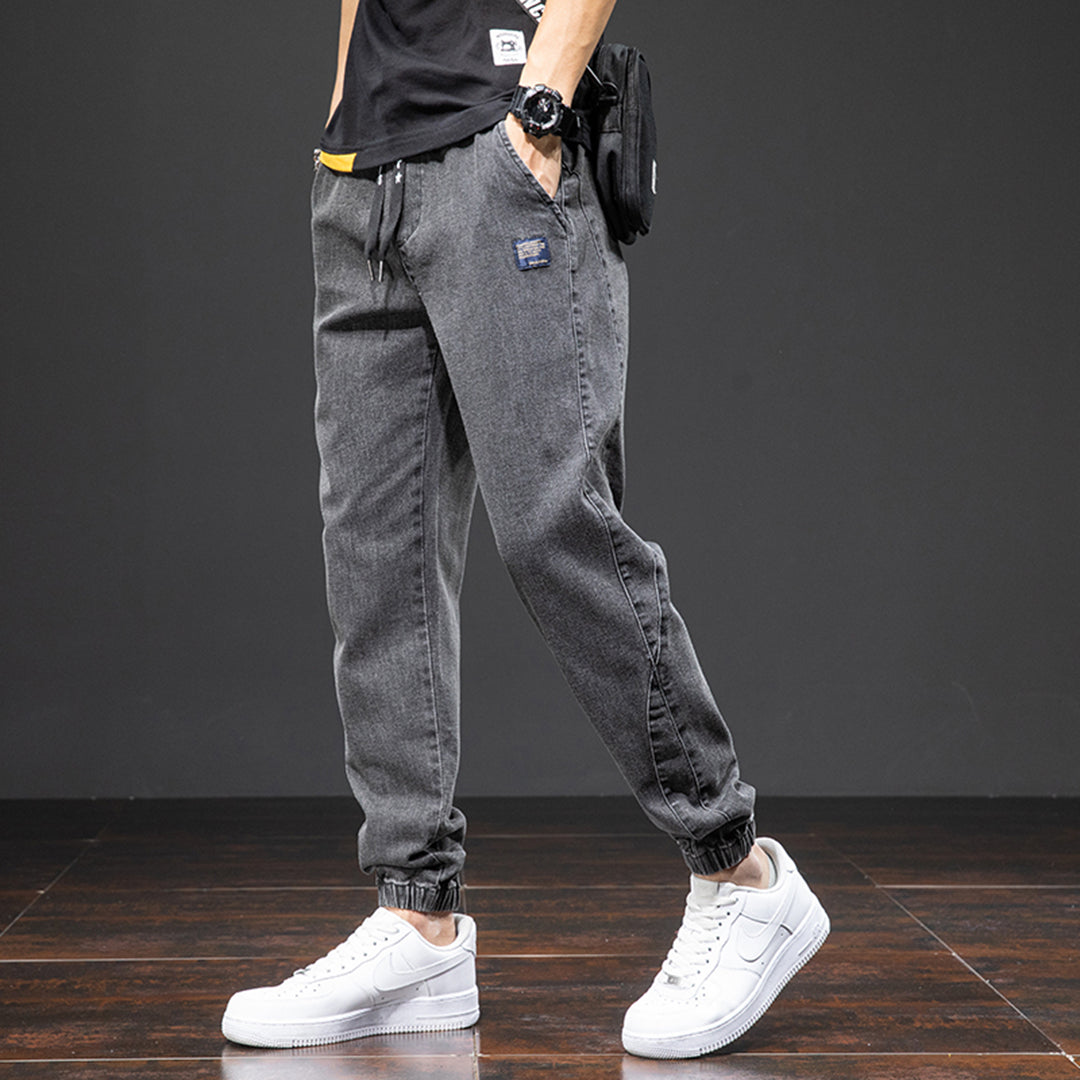 FRANKO - Joggerbyxor i denim