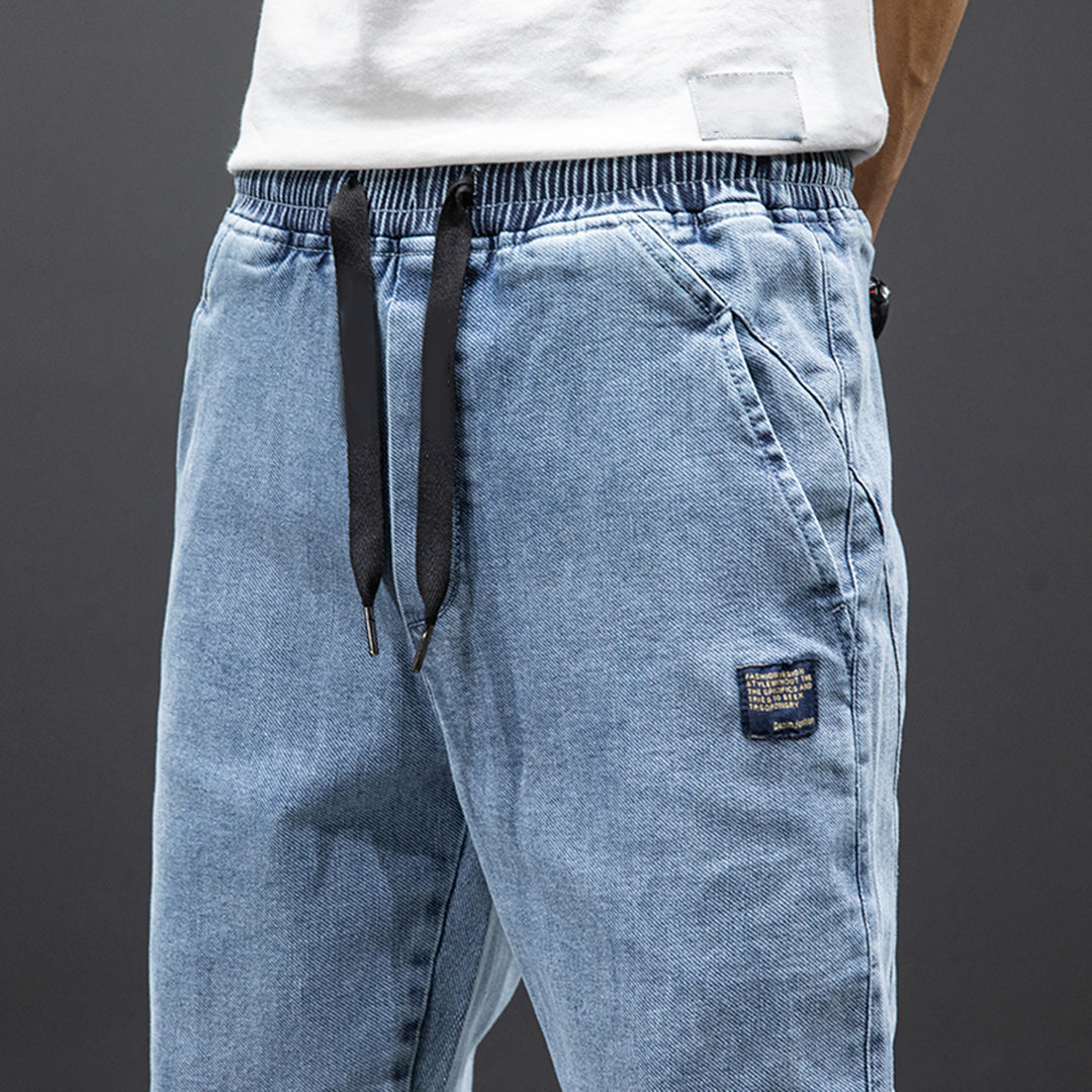 FRANKO - Joggerbyxor i denim