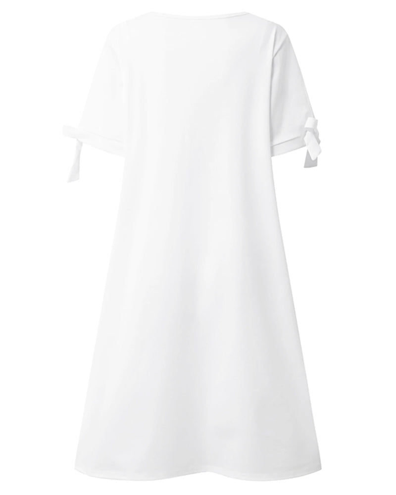 Elegant klänning med delad ärm