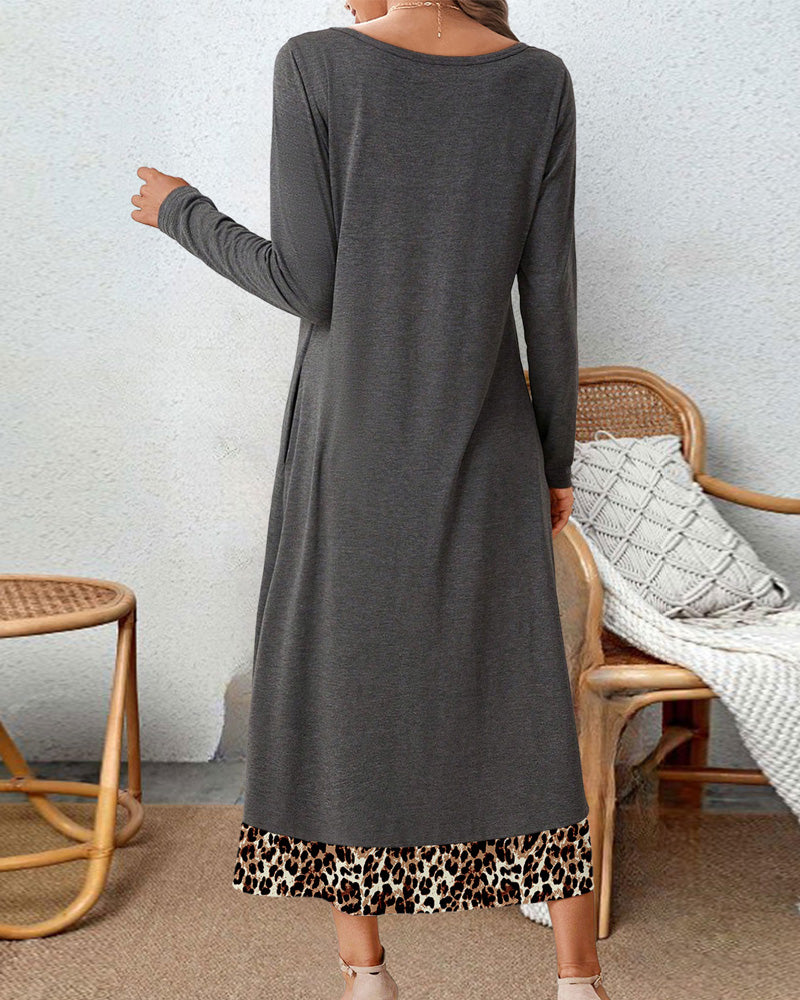 Klänning med fyrkantig halsringning