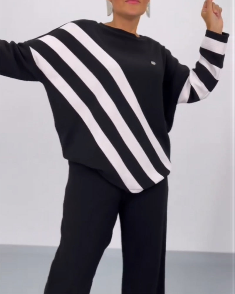 Lös randig sweatshirt med fladdermusärm