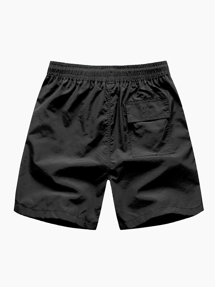 Tropisk blommig skjorta med knapp upp och badshorts