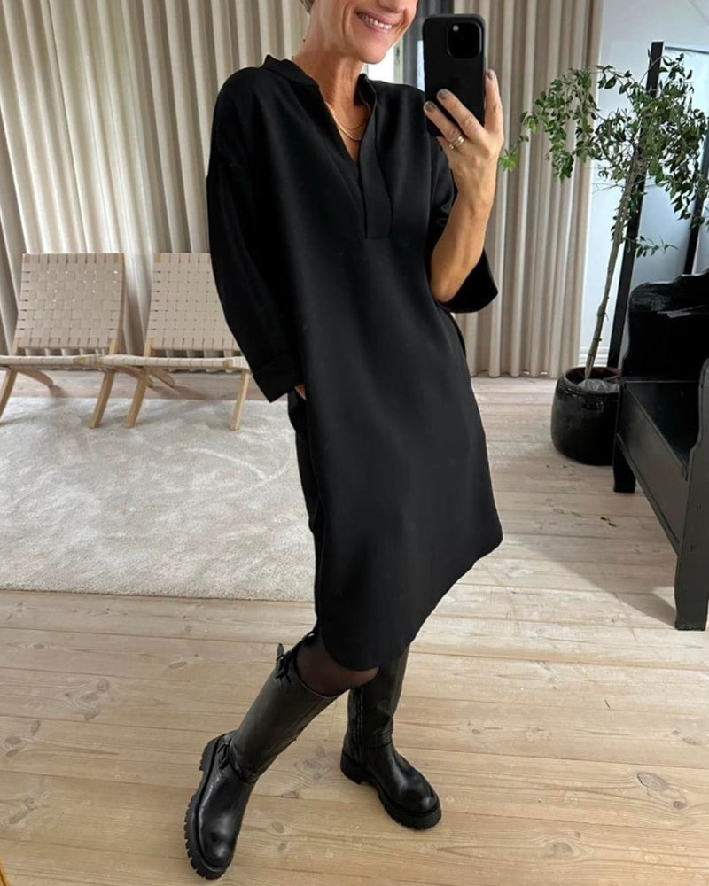 Skiftklänning med fickor och V-ringning