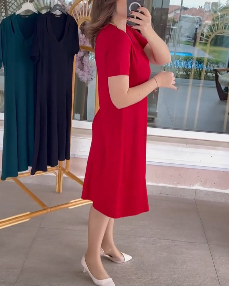 Klänning med korta ärmar och enfärgad