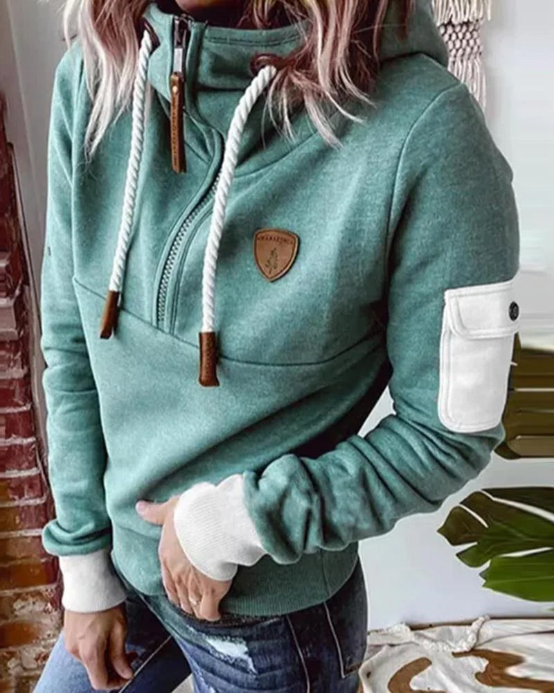 Avslappnad hoodie med halv dragkedja