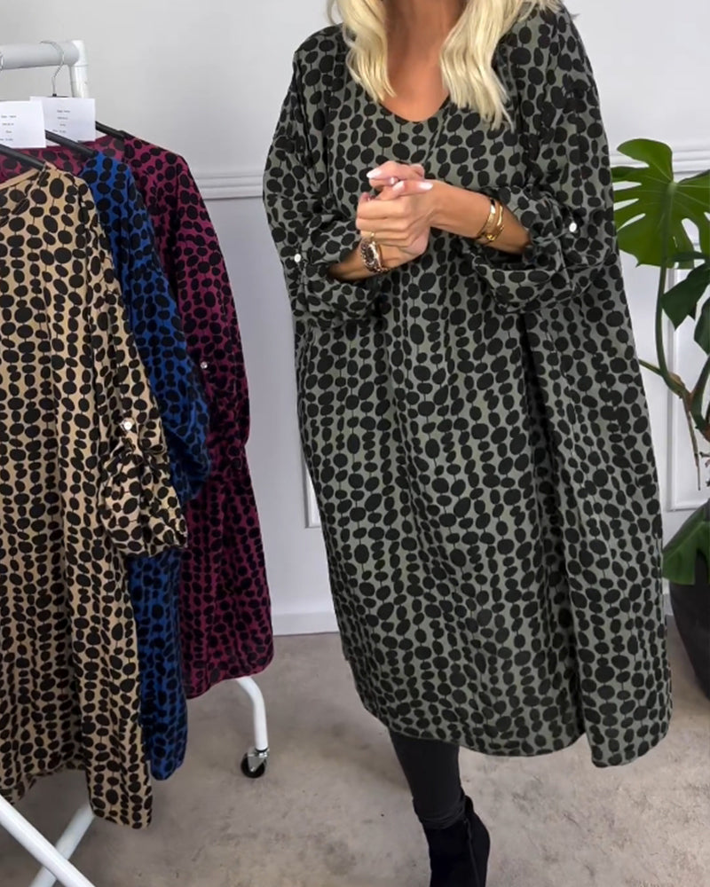 Retro prickig klänning med v-ringad hals