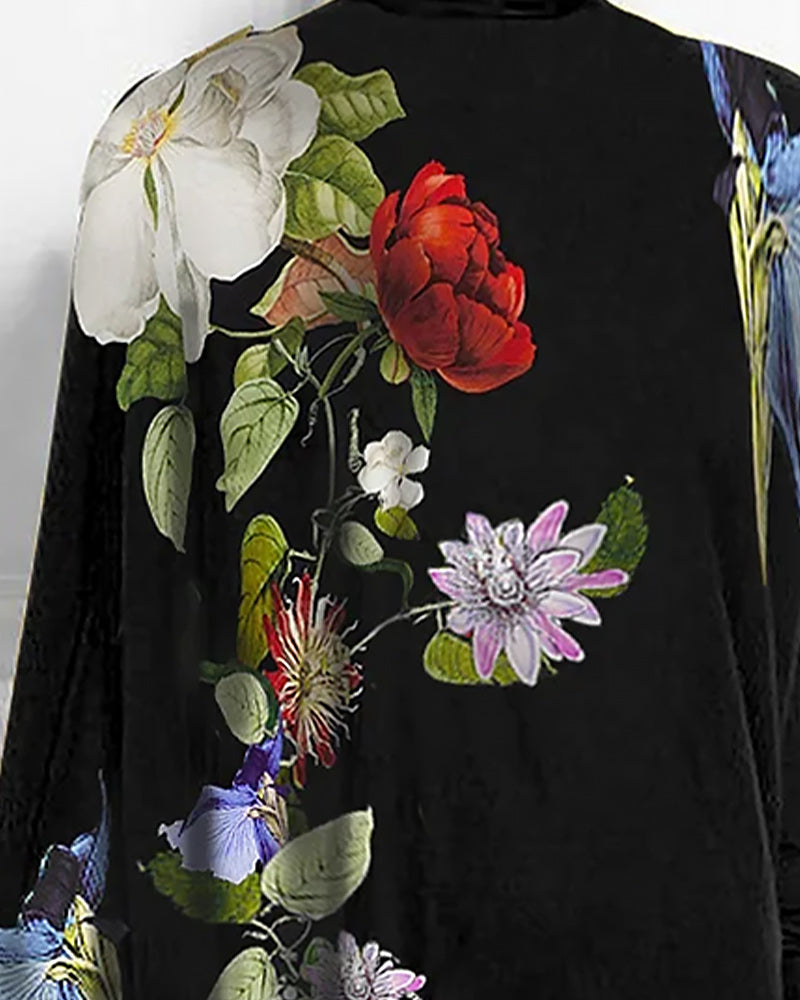 Topp med lös passform och blommönster