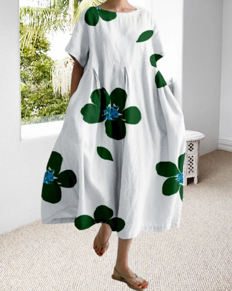 Lös kortärmad klänning med tryck