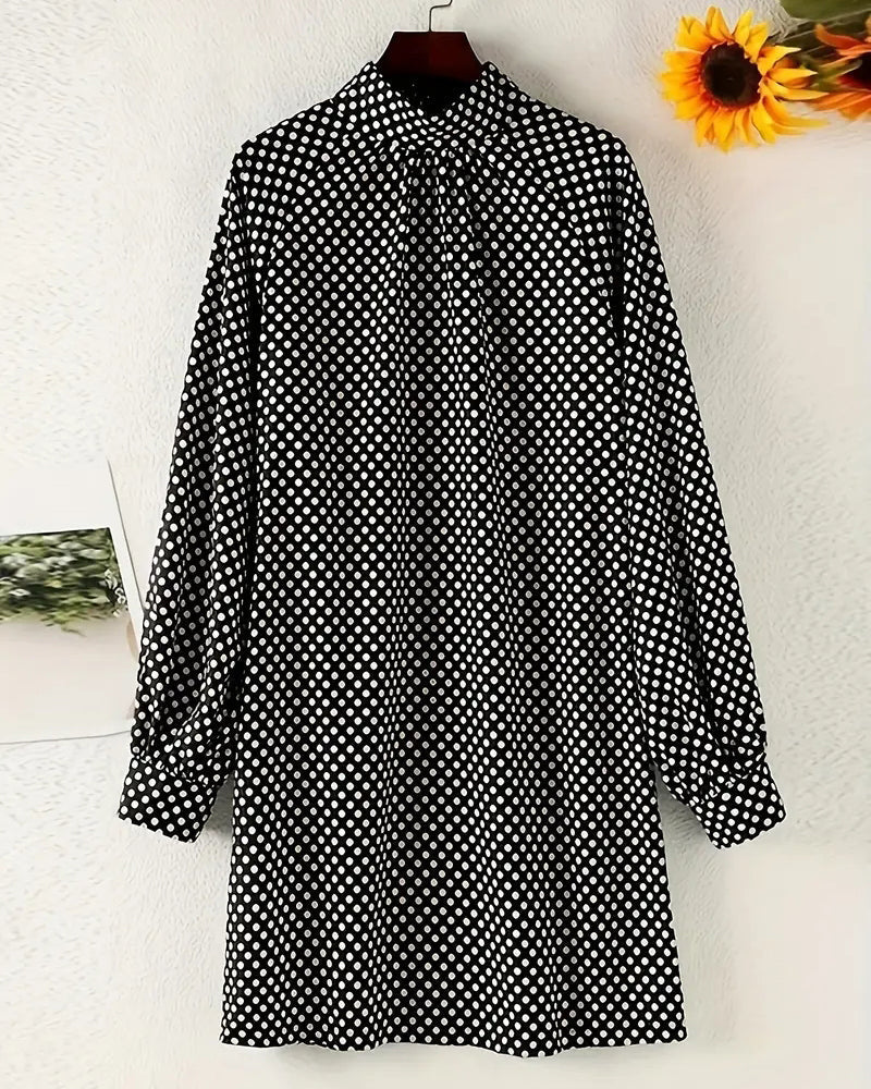 Elegant tryckt klänning med lösa ärmar