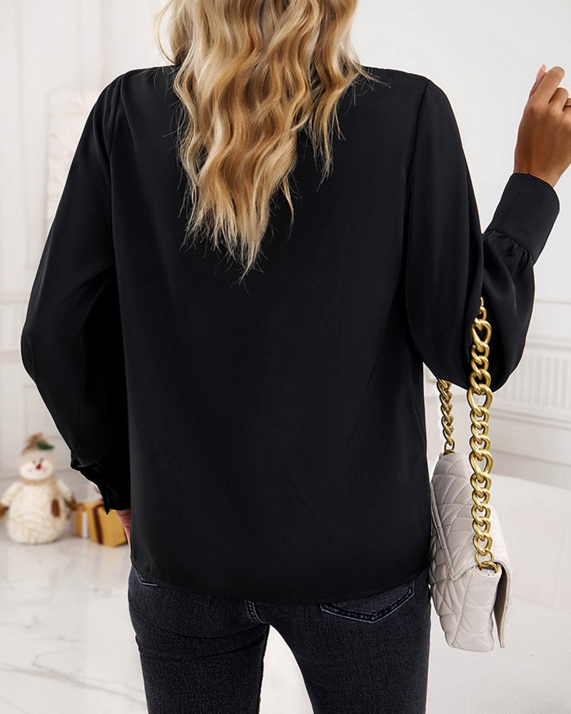 Elegant blus med volanger