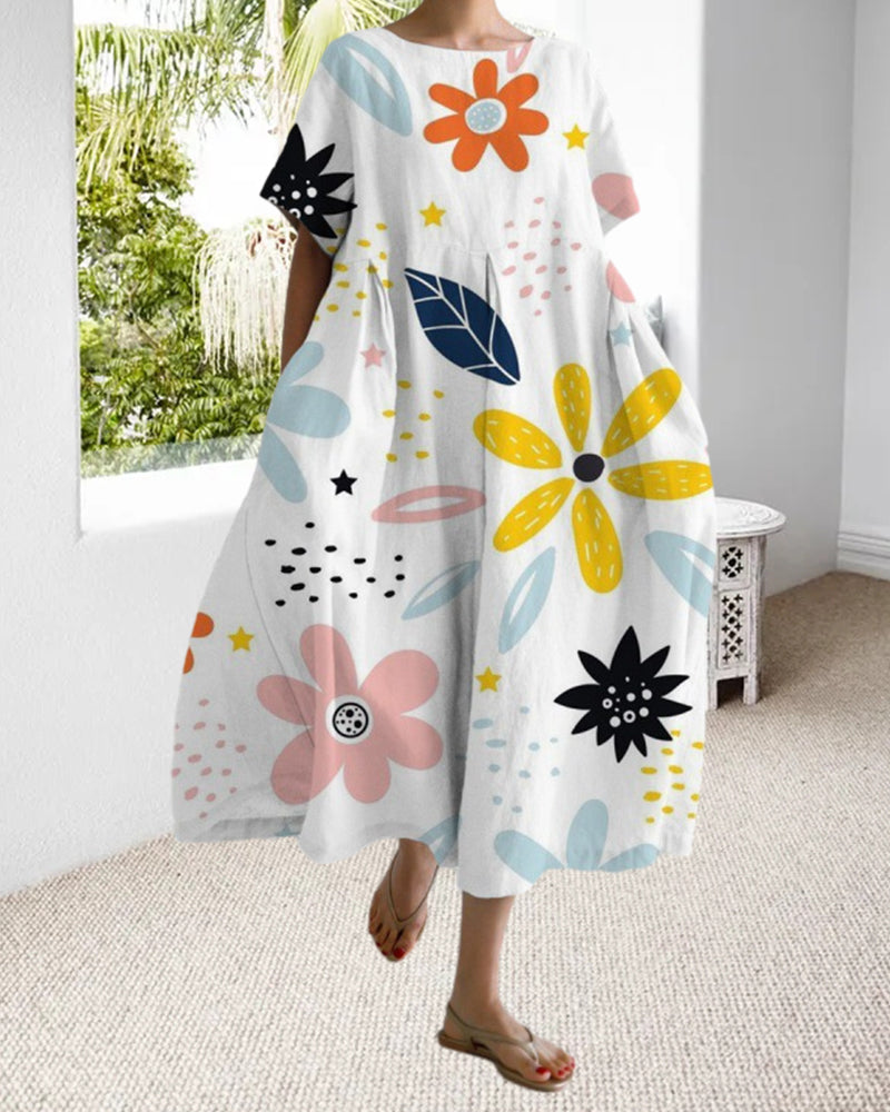 Lös kortärmad klänning med tryck