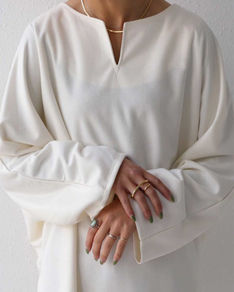 Lös v-ringad enfärgad topp