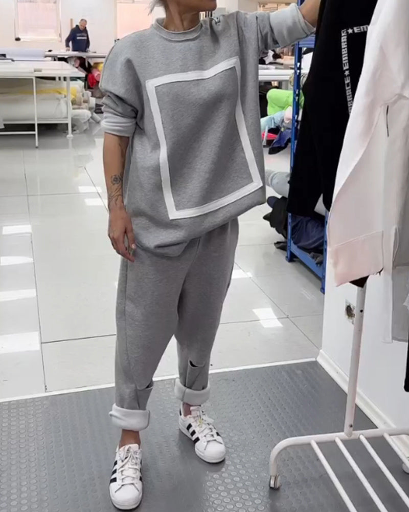 Enkel enfärgad hoodie