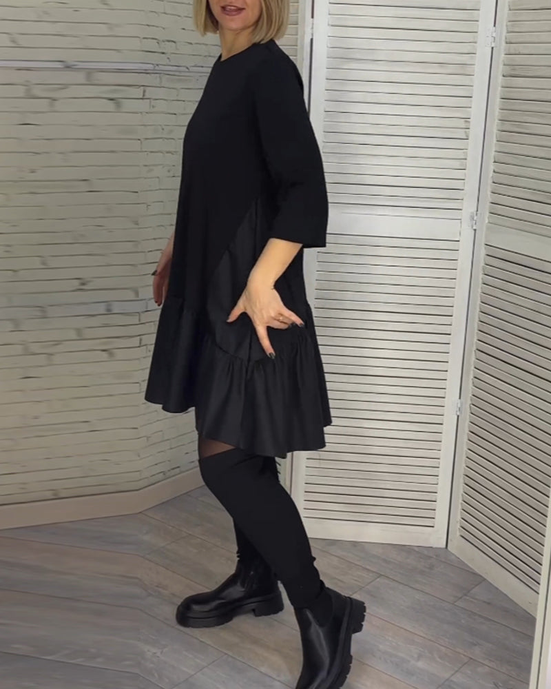 Klänning med rund hals och elegans