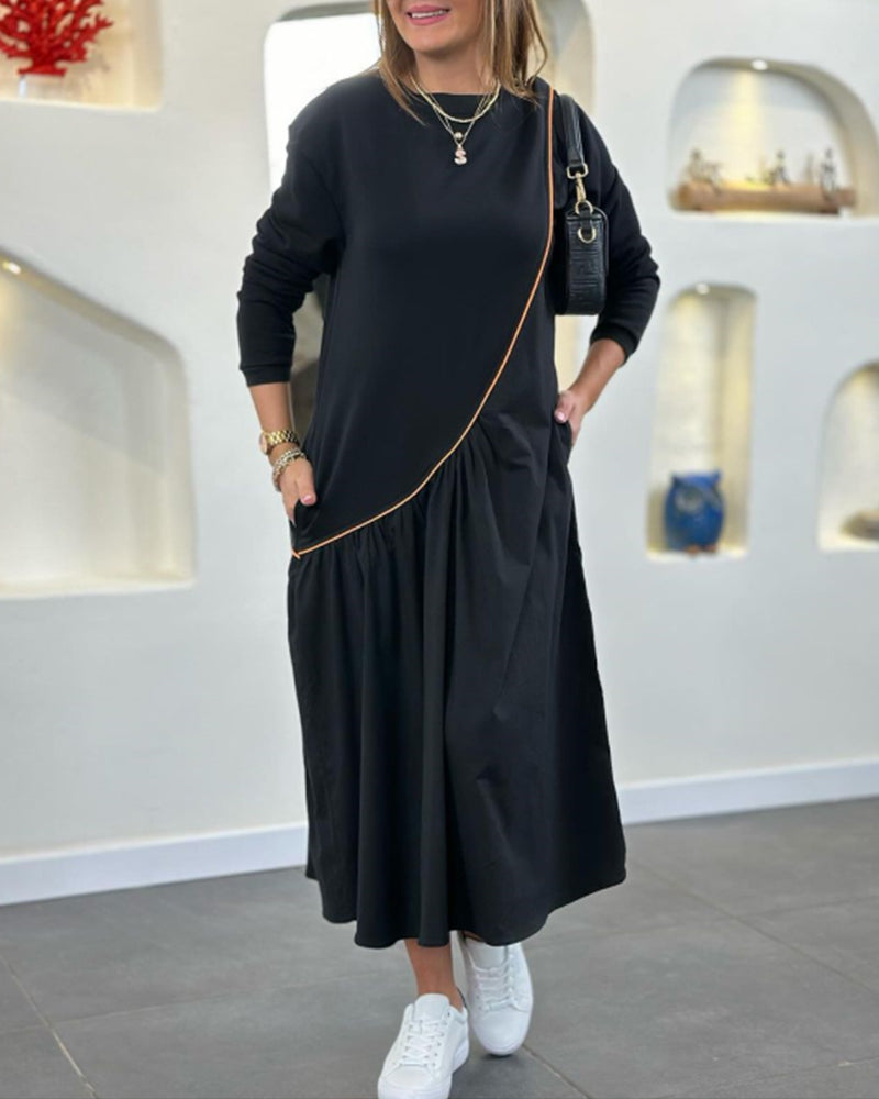 Skiftklänning med ficka och långärmad