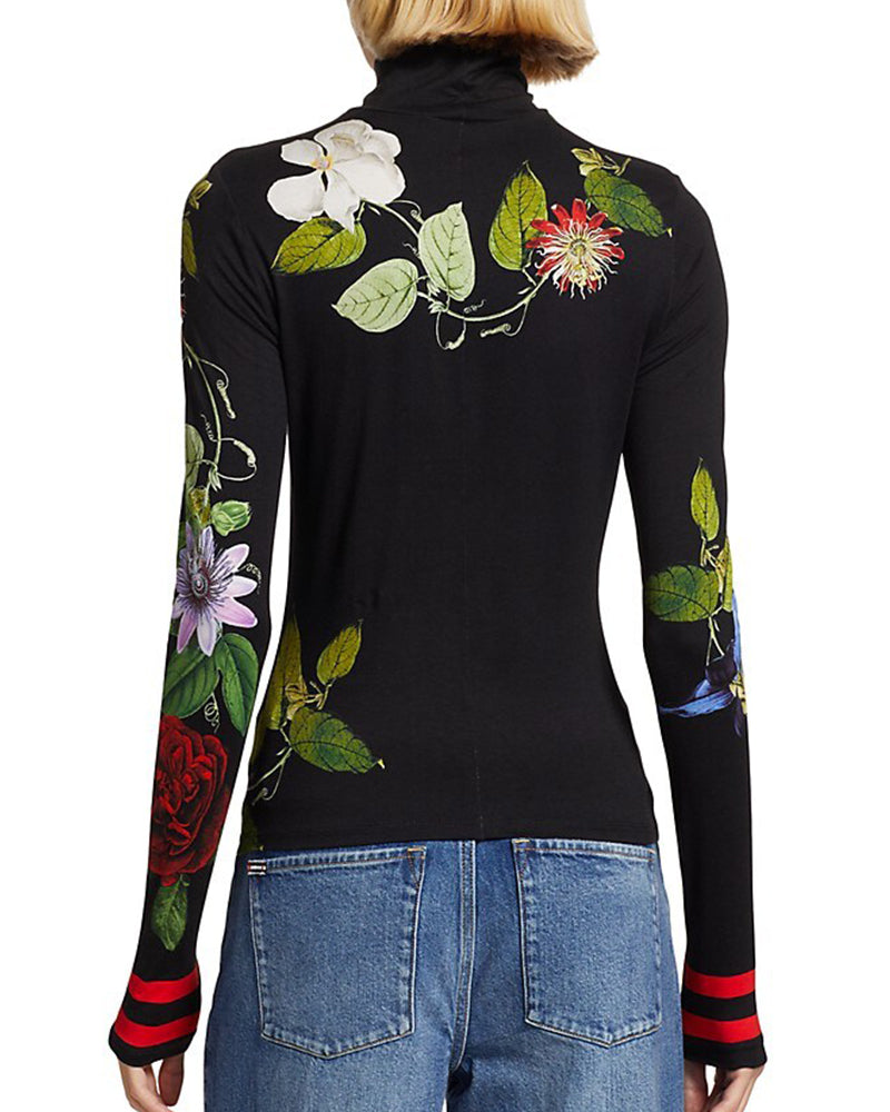 Elegant topp med turtleneck och blommönster