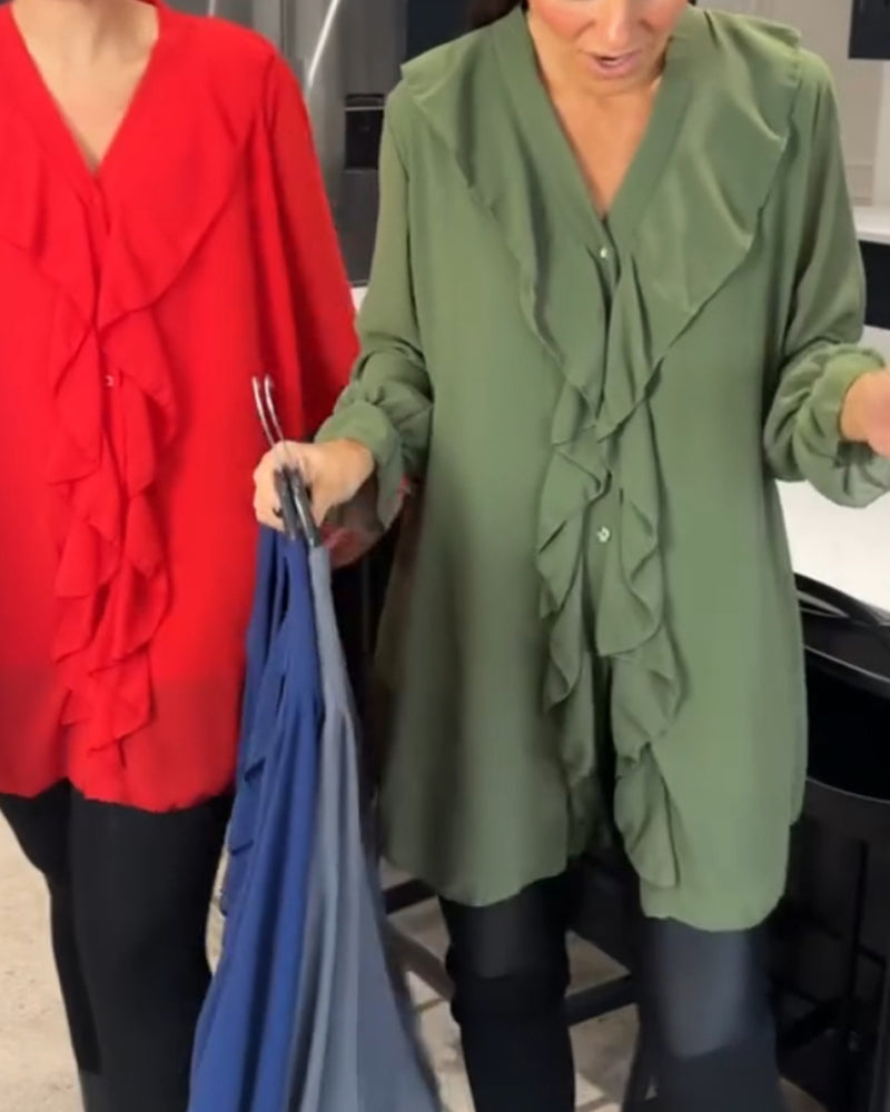 Enfärgad blus med v-ringad lotusblad