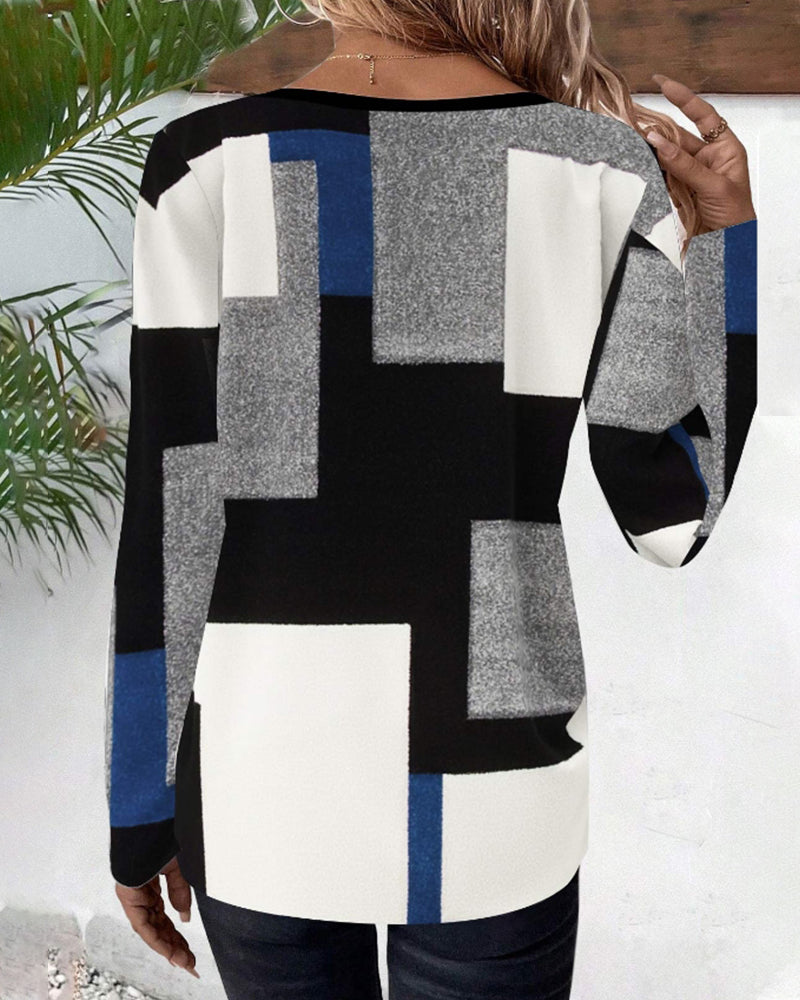 Topp med blockmönster och färgblockering