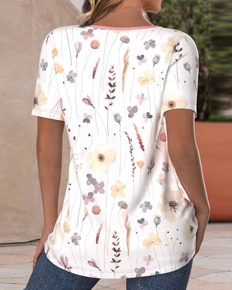 T-shirt med rund hals och blommiga och korta ärmar