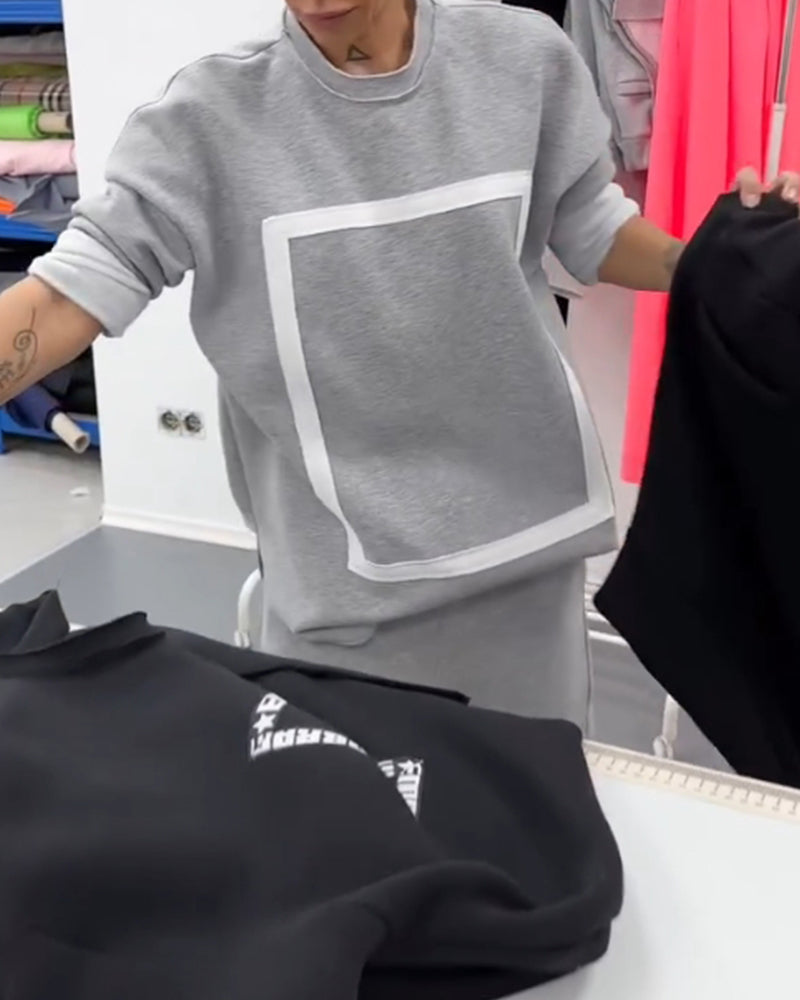 Enkel enfärgad hoodie