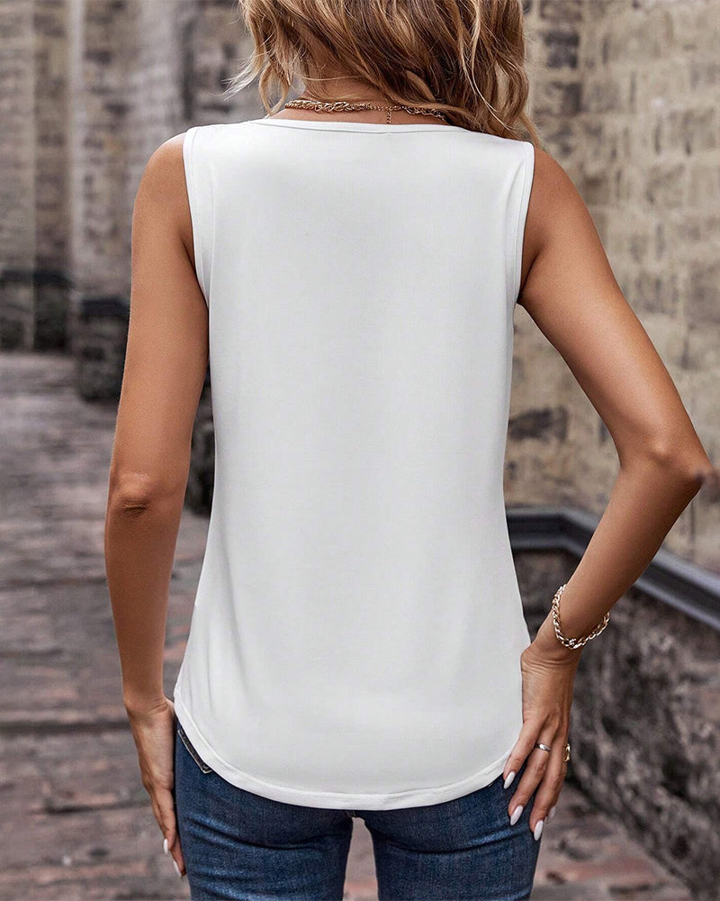 Ärmlös enfärgad blus