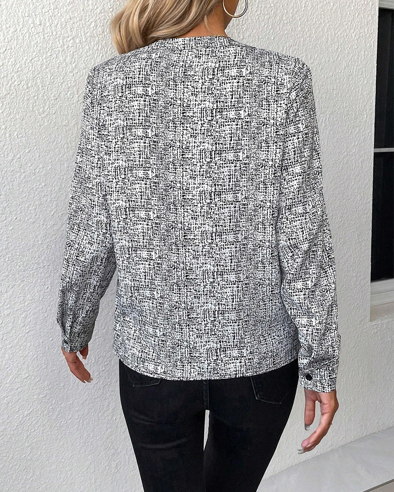 V-ringad elegant långärmad blus med tryck