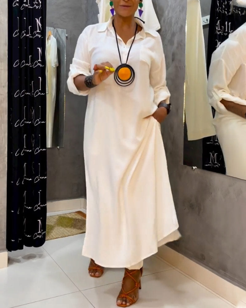 Enfärgad klänning med lapelficka